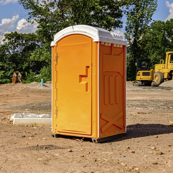 how often are the portable restrooms cleaned and serviced during a rental period in Iosco County